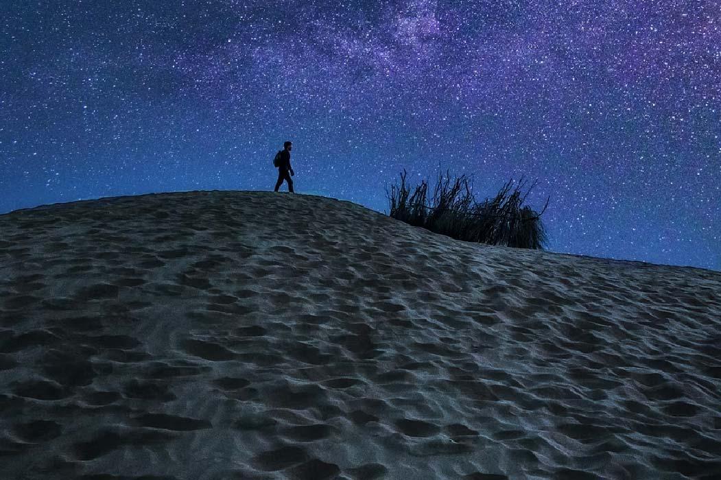 Dunes at night with stars